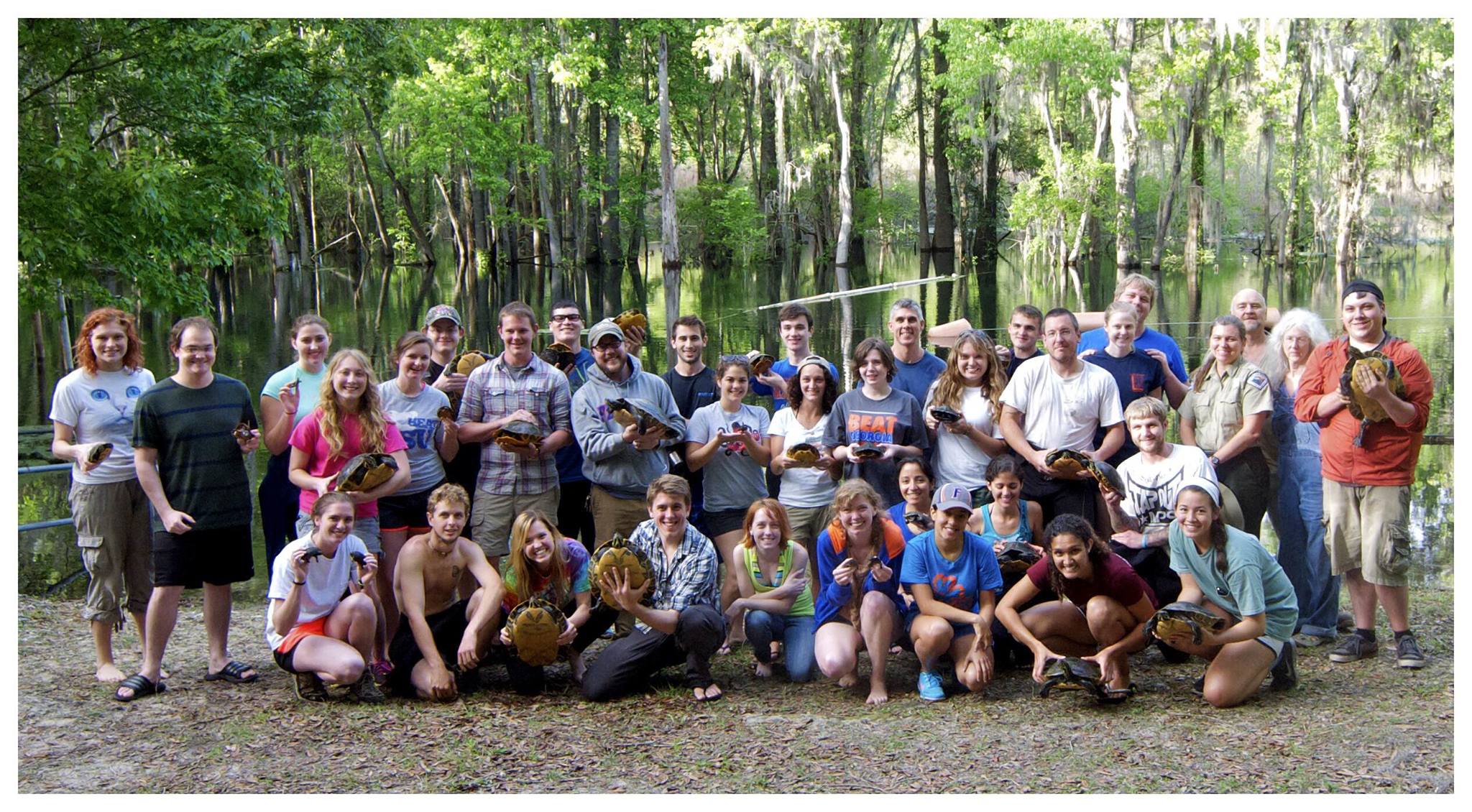 Students from Santa Fe College and the University of Florida posed for a group photo with park staff and volunteers from the naftrg