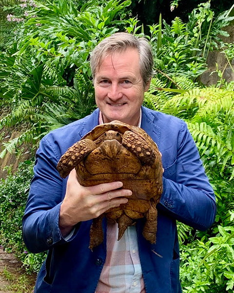 Image of Marc Dupuis-Desormeaux holding a Leopard Tortoise